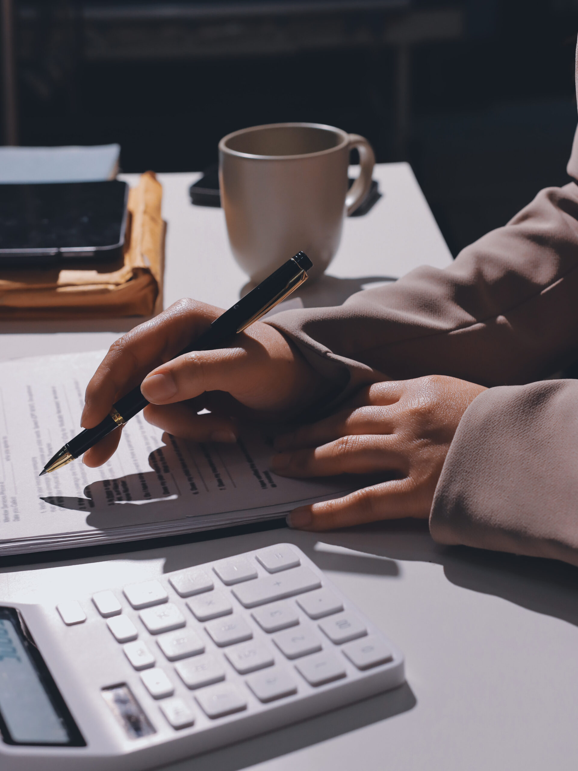 Female professional working on global payroll solutions